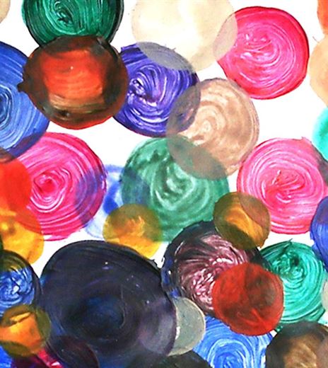 Circular color spots in various colors and sizes. The composition appears vivid and artistic.